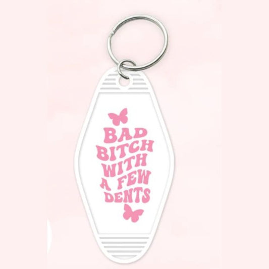 Bad Bitch with a Few Dents Motel Keychain